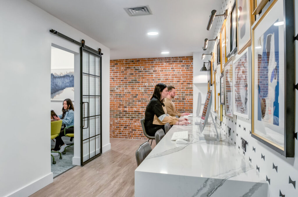 People working on computers in coworking space